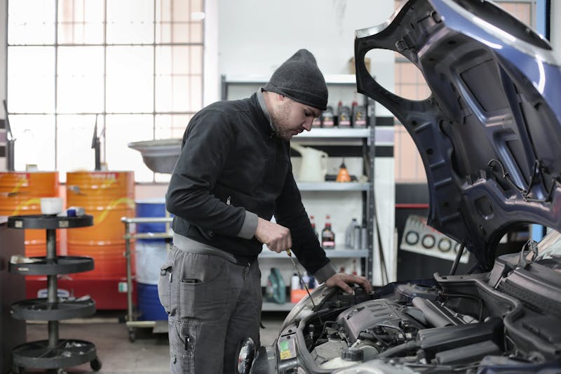 Automotive service advisor helping customer in Qatar dealership