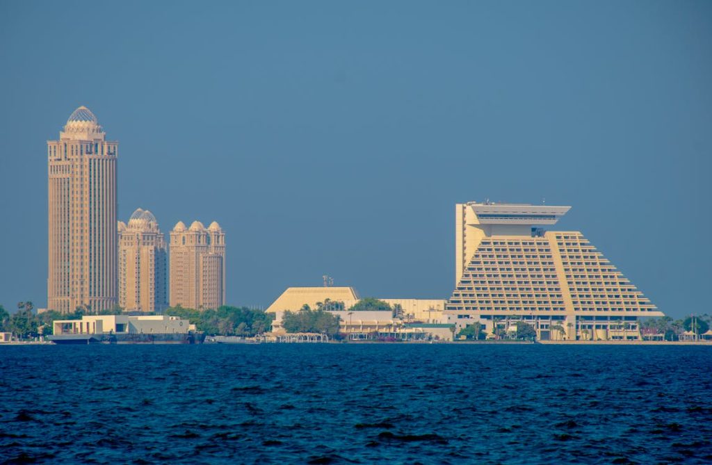 Luxury hotel buildings along Doha Qatar waterfront skyline